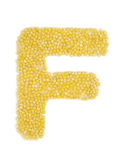 Letter F of the English alphabet made from millet on an isolated background.