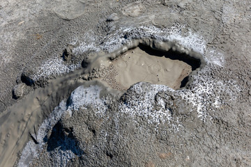 Mud geyser or mud volcano. Geological formation hydrogeological