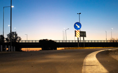 Highway exit with traffic signs.