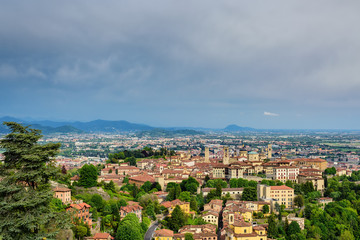 View of the city of Bergamo and its central historical part from the height of the observation deck of the castle of Di San Vigilio. Castle di San Vigilio is a public place
