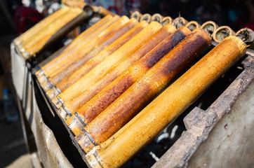 rice cooked in bamboo tubes