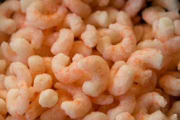 Close up of peeled and frozen shrimps