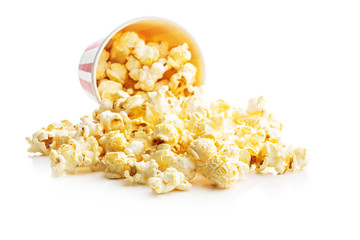 Sweet popcorn in striped paper cup.