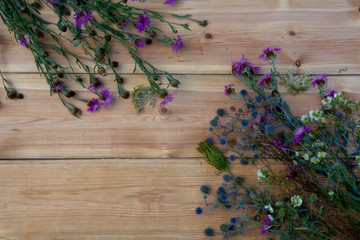 bouquet of wildflowers on a wooden table
