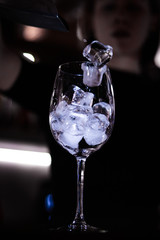 glass of water on black