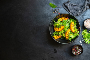 grilled peach salad lettuce leaves mix nectarine ingredient natural product portion serving size healthy top view place for text copy space keto or paleo diet raw