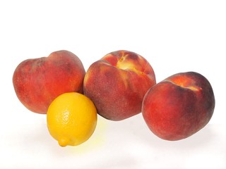 delicious red and yellow peaches close up