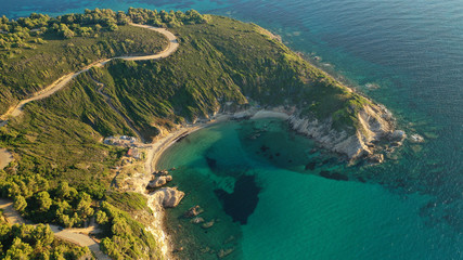 Aerial drone photo of secluded emerald beach of Krifi or "hidden beach" in island of Skiathos, Sporades, Greece