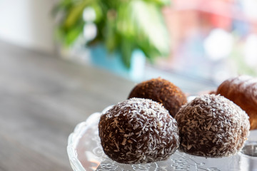 Chocolate potato cake with sprinkling. Copy space