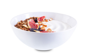Greek yogurt chocolate nuts oatmeal granola with figs on a white isolated background