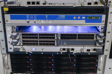 The technical platform of the Internet provider. Server equipment is configured in a modern data center. Computer hardware works in the server room.