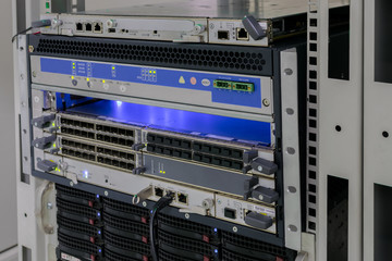 Front panel of powerful routers. Computer equipment works in the server room of the data center.