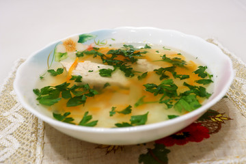Close up сhicken soup. The finished dish is on the table.