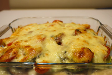 Close up vegetable casserole. The finished dish is on the table.