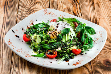 fresh salad with poached egg