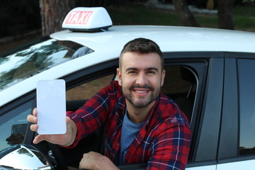 Taxi driver showing app in smartphone 