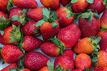 
lots of juicy and delicious close-up strawberries