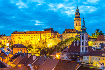 Fototapeta premium Cesky Krumlov by night. View of castle and old town houses, Czech Republic. UNESCO World Heritage Site