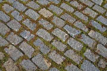 Cobblestone background with grass