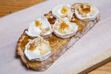 Bruschetta with fig jam, goat cheese