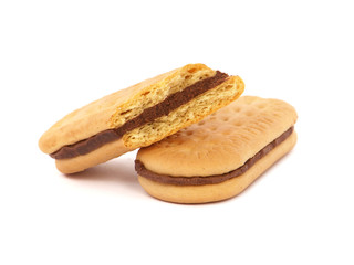 Sandwich cookies or biscuits filled with cocoa cream, isolated on white