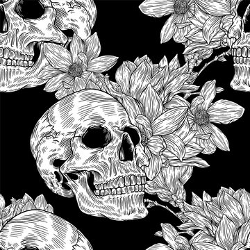Seamless pattern with image a skull and with magnolia flowers. Hand drawn vintage engraving style. 