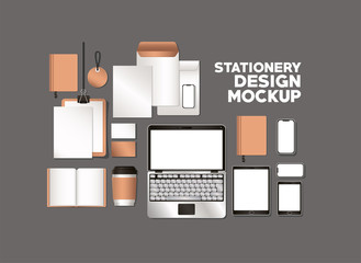 laptop and mockup set on gray background of corporate identity and stationery design theme Vector illustration © Grgroup