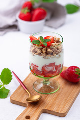 Dessert with strawberry, yogurt and granola