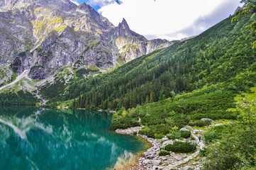 The beautiful lake of Morskie Oko in the Tatra Mountains, near Zakopane, Poland - obrazy, fototapety, plakaty