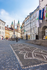 LJUBLJANA, SLOVENIA, 5th AUGUST 2019: The beautiful main street of the historic center, with the Cathedral in the background