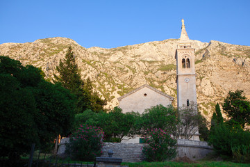 Fototapeta na wymiar Church of St. Eustachius on the Kotor Bay coast 