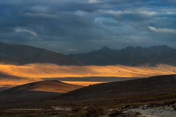 landscape of  mountains and sky with dramatic light ,  deosai plains , landscape of  karakorum...