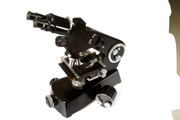 black vintage microscope isolated on white background