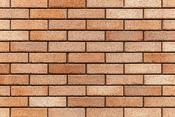 Brown stone brick wall texture and seamless background