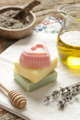 Handmade soap with herbal ingredients around. Homemade toxic-free natural organic cosmetic.