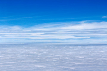 Naklejka na ściany i meble Dramatic cloudscape from the airplane's window