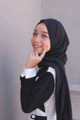 Fashion portrait of young beautiful asian muslim woman with wearing hijab.