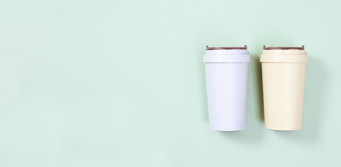Reusable eco coffee cup. Zero waste concept. Take away big mug for drinks.