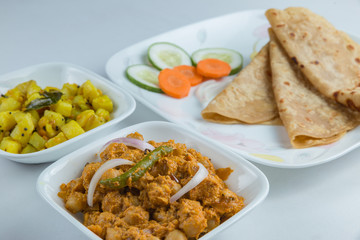 Spicy Indian vegetarian breakfast meal - Indian naan bread - Chapati bread