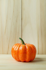pumpkin on wood for food or halloween content.
