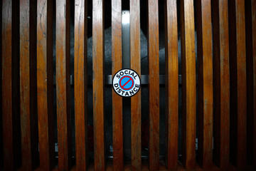 Social Distance sticker on mall bench