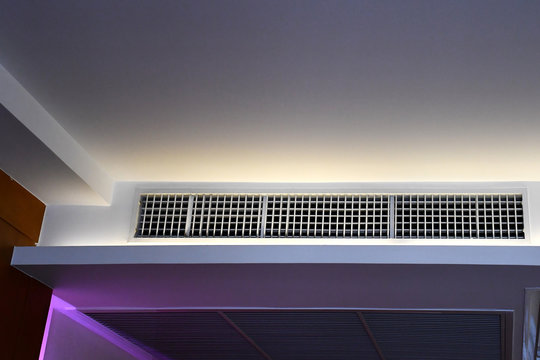 built in ceiling unit of FCU and return air grill, VRV VRF multi-split type air conditioner system in hotel room, Concept image for HVAC system or temperature .