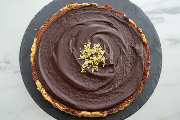 sweet home made chocolate elderflower cake on a table