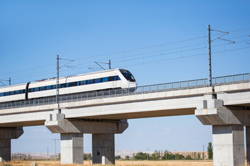 View of a high-speed train crossing a viaduct 