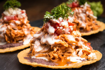 Hard shell Nachos with pulled pork and sauce