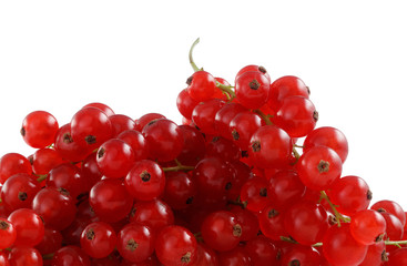 Heap of red currant berries isolated on white background