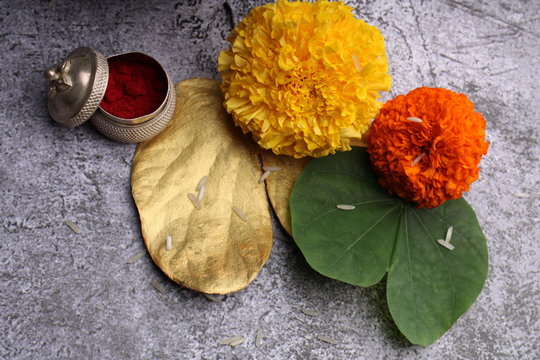 Dussehra or Vijaya dashami greeting card. Green leaf golden, colord leaf Rie and kumkum.