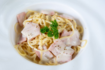 Closeup spaghetti carbonara in white plate