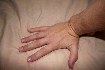 Closeup shot of a right hand of a 40 years old male.