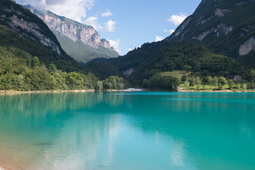 Fototapeta na wymiar Panoramic view of Tenno lake in Trentino Alto-Adige during summer day, Italy
